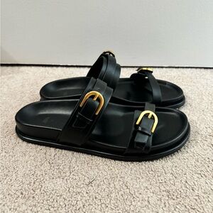 Modern brand new black sandals from Zara